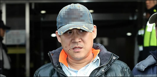 경기 안산 인질살해범 김상훈이  머리 통증을 호소하며 병원에 입원해 27일 재판에 출석하지 않았다. (자료사진) ⓒ연합뉴스 