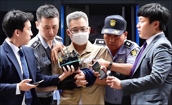 포털을 통해 여론조작 활동을 펼친 혐의를 받고 있는 드루킹(본명 김동원·49)이 지난 6월 28일 오후 서울 서초동 특검 사무실에 피의자 신분으로 소환되고 있다. ⓒ데일리안