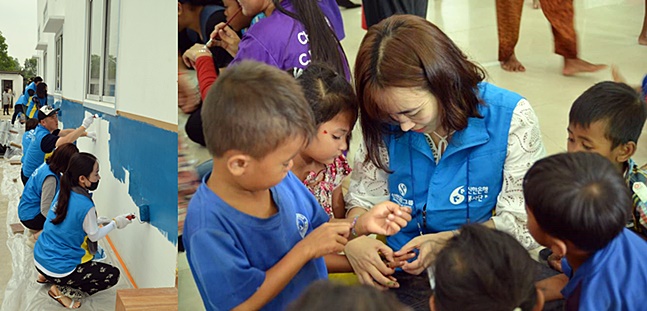신한은행 임직원 봉사단이 13일 캄보디아 따게오주 쩜뻑마을에서 교육환경 개선 작업과 함께 어린이를 위한 페이스·핸드 페인팅을 진행한 모습ⓒ신한은행