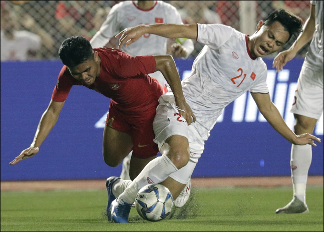인도네시아 선수들은 베트남을 향해 거칠게 대응했다. ⓒ 뉴시스