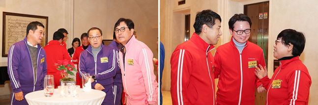빨강, 파랑, 보라, 핑크색 SKinnoMan(스키노맨) 유니폼을 입은 임원들이 행사장에서 이야기를 나누고 있다.ⓒSK이노베이션