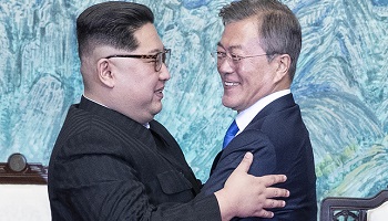 김정은 '완전한 비핵화 의지' 강조…종전선언 '파란불'?