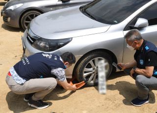 상습체납차량에 족쇄 채우는 단속반