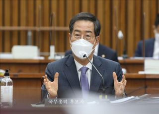 한덕수 "공직기간에 배우자 전시회 0회"…이해충돌 의혹 정면반박