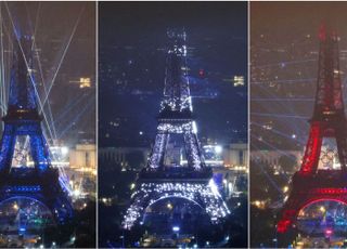 "파리 에펠탑 조명쇼, 빗줄기 뚫고 하늘 밝혔다"