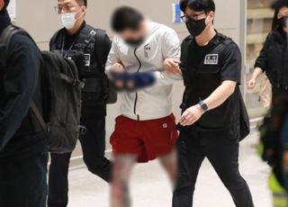 "몸 덮은 문신도…" 얼굴 가린 캄보디아 송환자들