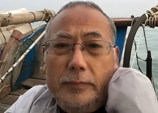 검찰, 고무보트 밀입국 中 반체제 인사 둥광핑 기소유예 처분